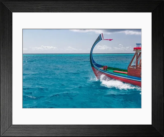 Framed Print : Maldives traditional wooden boat Dhoni and perfect blue sea with lagoon. Luxury tropical paradise concept. Exotic travel landscape, seascape Maldives Framed Print : Maldives traditional wooden boat Dhoni and perfect blue sea with lagoon. Luxury tropical paradise concept. Exotic travel landscape, seascape Maldives