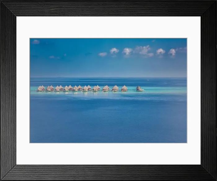 Framed Print : Amazing aerial landscape, luxury tropical resort or hotel with water villas and beautiful beach scenery. Perfect bird eyes view in Maldives, landscape Framed Print : Amazing aerial landscape, luxury tropical resort or hotel with water villas and beautiful beach scenery. Perfect bird eyes view in Maldives, landscape