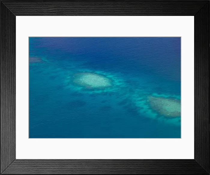 Framed Print : Aerial photo of beautiful paradise Maldives tropical lagoon with coral reef beach on island. Summer and travel vacation concept.View from seaplane Framed Print : Aerial photo of beautiful paradise Maldives tropical lagoon with coral reef beach on island. Summer and travel vacation concept.View from seaplane