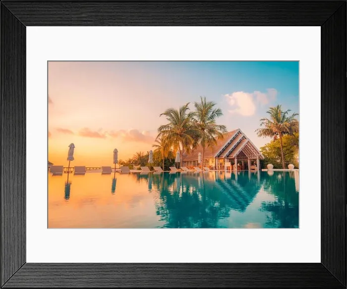 Framed Print : Beautiful poolside and sunset sky. Luxurious tropical beach landscape, deck chairs and loungers and water reflection. Amazing vacation, summer holiday Framed Print : Beautiful poolside and sunset sky. Luxurious tropical beach landscape, deck chairs and loungers and water reflection. Amazing vacation, summer holiday