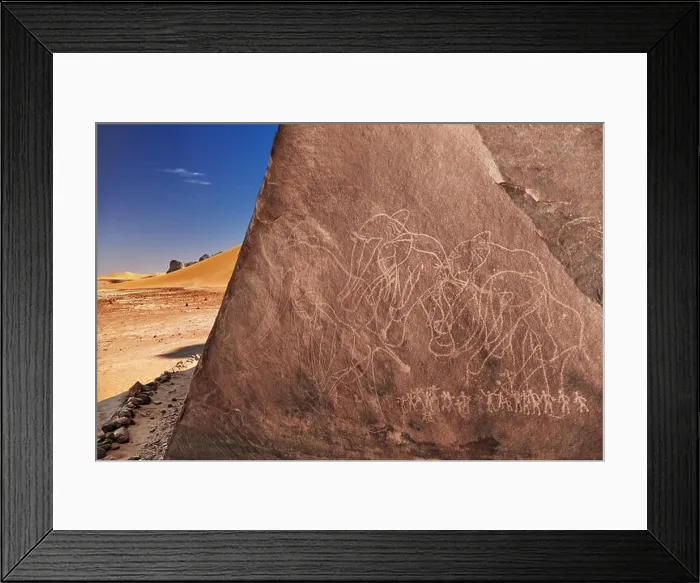 Framed Print : Ancient rock engraving in Sahara Desert, Tadrart, Algeria Framed Print : Ancient rock engraving in Sahara Desert, Tadrart, Algeria