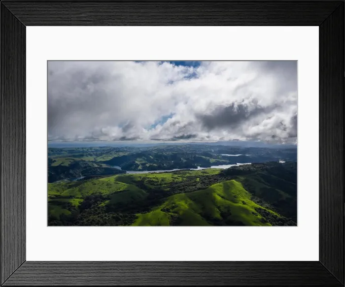 Framed Print : A beautiful morning lights the green hills around the San Pablo Reservoir in Northern California. A wet winter has caused lush vegetation growth Framed Print : A beautiful morning lights the green hills around the San Pablo Reservoir in Northern California. A wet winter has caused lush vegetation growth