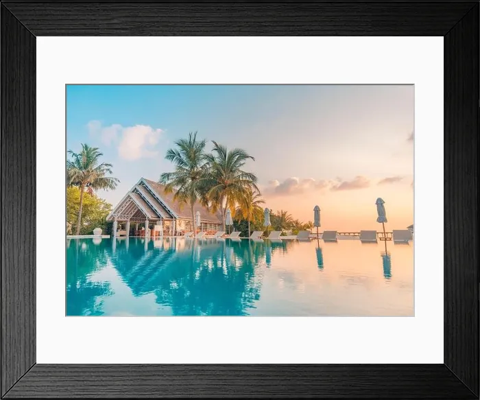 Framed Print : Beautiful poolside and sunset sky. Luxurious tropical beach landscape, deck chairs and loungers and water reflection. Amazing vacation, summer holiday Framed Print : Beautiful poolside and sunset sky. Luxurious tropical beach landscape, deck chairs and loungers and water reflection. Amazing vacation, summer holiday