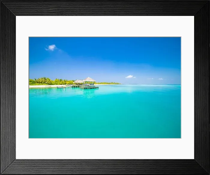 Framed Print : Luxury summer sea island landscape, tropical scenery. Blue sky, palm trees on white sand, calm ocean water. Exotic vacation, holiday view Framed Print : Luxury summer sea island landscape, tropical scenery. Blue sky, palm trees on white sand, calm ocean water. Exotic vacation, holiday view