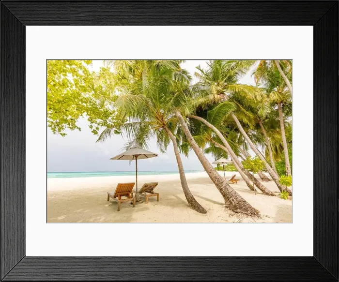 Framed Print : Tropical beach resort island view. Palm trees under soft blur sky Framed Print : Tropical beach resort island view. Palm trees under soft blur sky