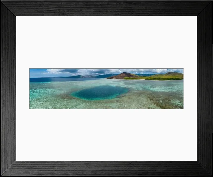 Framed Print : A deep blue hole is found on a shallow reef in Indonesia
