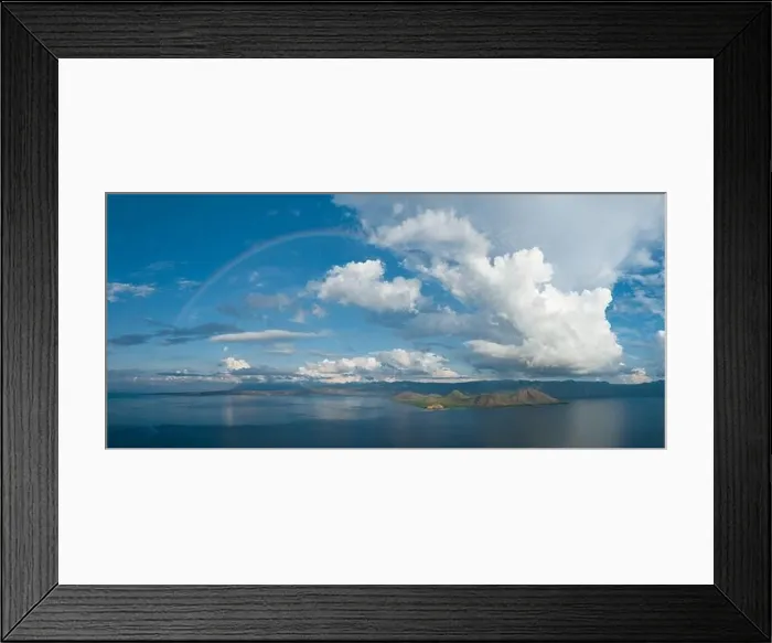 Framed Print : A full rainbow stretches across the sky near Flores, Indonesia. This beautiful region has both a wet and a dry season Framed Print : A full rainbow stretches across the sky near Flores, Indonesia. This beautiful region has both a wet and a dry season