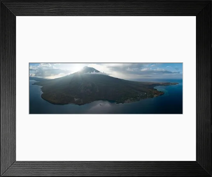 Framed Print : Evening sunlight peeks around the active volcano of Iliape in the Lesser Sunda Islands of Indonesia. This stratovolcano lies between Flores and Alor Framed Print : Evening sunlight peeks around the active volcano of Iliape in the Lesser Sunda Islands of Indonesia. This stratovolcano lies between Flores and Alor
