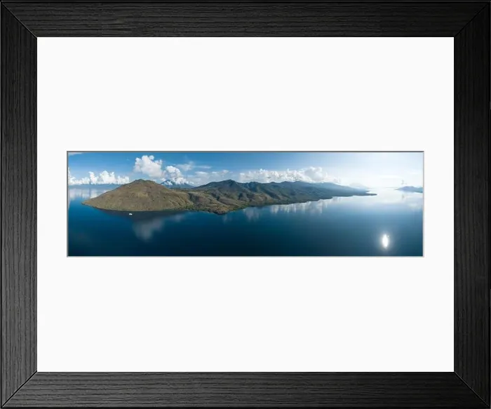Framed Print : Calm seas surround islands found just north of Flores, Indonesia. This region is known for its extraordinary marine biodiversity Framed Print : Calm seas surround islands found just north of Flores, Indonesia. This region is known for its extraordinary marine biodiversity