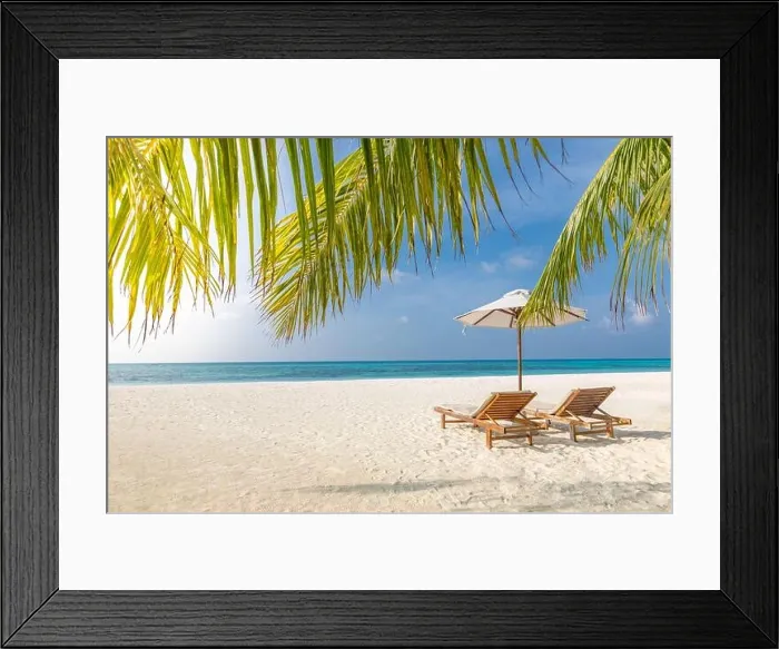 Framed Print : Paradise beach. Perfect tropical island. Beautiful palm trees and tropical beach nature. Moody blue sky and blue lagoon. Luxury travel summer holiday Framed Print : Paradise beach. Perfect tropical island. Beautiful palm trees and tropical beach nature. Moody blue sky and blue lagoon. Luxury travel summer holiday