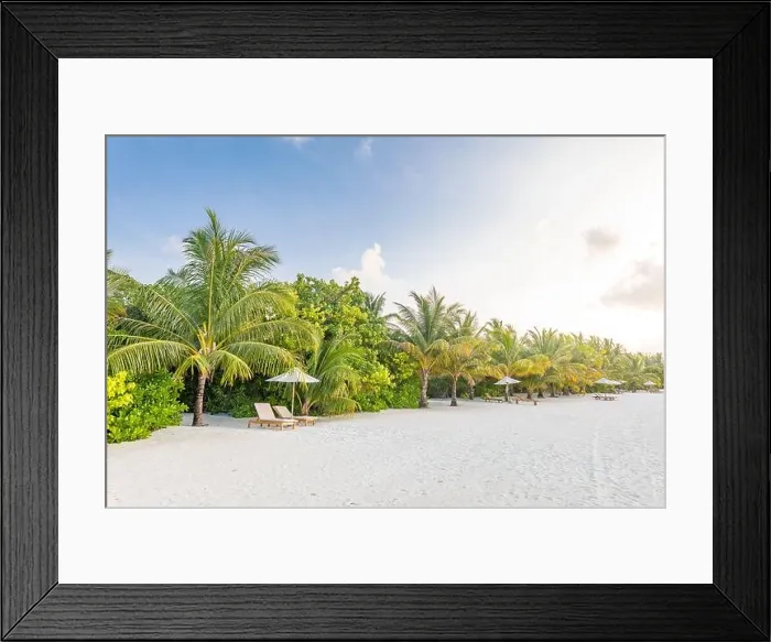 Framed Print : Tropical beach resort island view. Palm trees under soft blur sky Framed Print : Tropical beach resort island view. Palm trees under soft blur sky