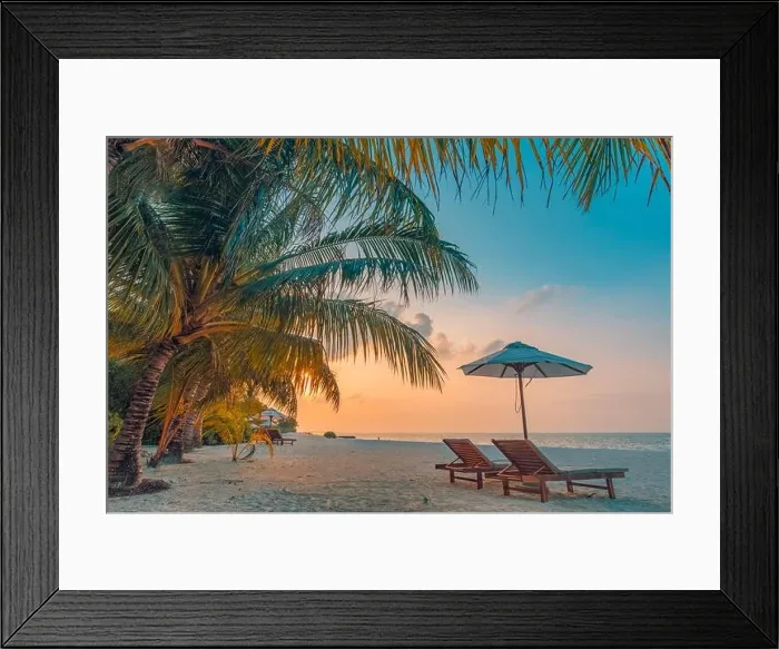 Framed Print : Beautiful tropical sunset landscape, two sun beds, loungers, umbrella under palm tree. Luxury summer holiday, vacation, calm colorful twilight sky Framed Print : Beautiful tropical sunset landscape, two sun beds, loungers, umbrella under palm tree. Luxury summer holiday, vacation, calm colorful twilight sky