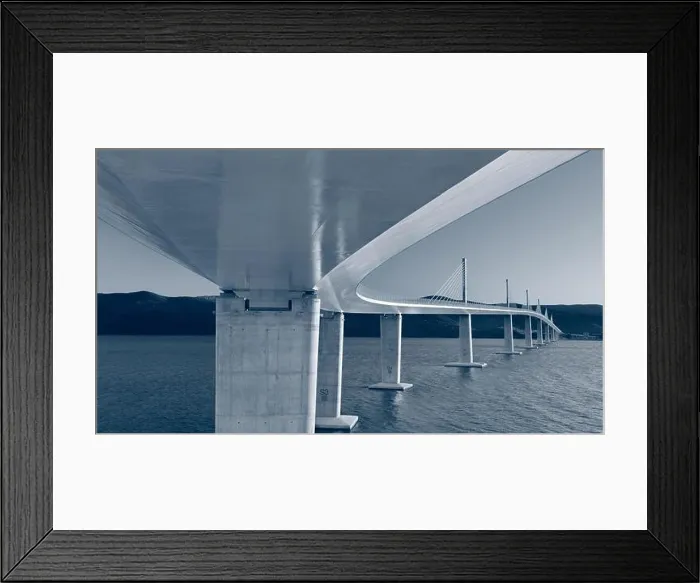 Framed Print : Peljesac Bridge, Croatia. Toned image of beautiful modern multi-span cable-stayed Peljesac Bridge over the sea in Dubrovnik-Neretva County, Croatia Framed Print : Peljesac Bridge, Croatia. Toned image of beautiful modern multi-span cable-stayed Peljesac Bridge over the sea in Dubrovnik-Neretva County, Croatia