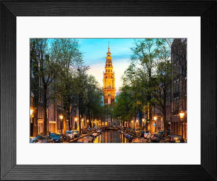Framed Print : Amsterdam Zuiderkerk church tower at the end of a canal in the city of Amsterdam, Netherlands at night Framed Print : Amsterdam Zuiderkerk church tower at the end of a canal in the city of Amsterdam, Netherlands at night