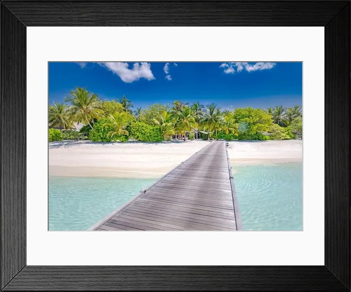 Framed Print : Beautiful beach with jetty, palm trees and moody sky. Summer vacation travel holiday background. Maldives paradise beach luxury travel summer holiday Framed Print : Beautiful beach with jetty, palm trees and moody sky. Summer vacation travel holiday background. Maldives paradise beach luxury travel summer holiday