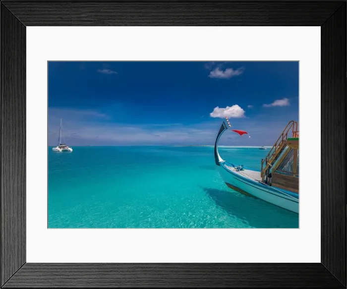 Framed Print : Inspirational Maldives beach design. Maldives traditional boat Dhoni and perfect blue sea with lagoon. Luxury tropical paradise. Summer vacation Framed Print : Inspirational Maldives beach design. Maldives traditional boat Dhoni and perfect blue sea with lagoon. Luxury tropical paradise. Summer vacation
