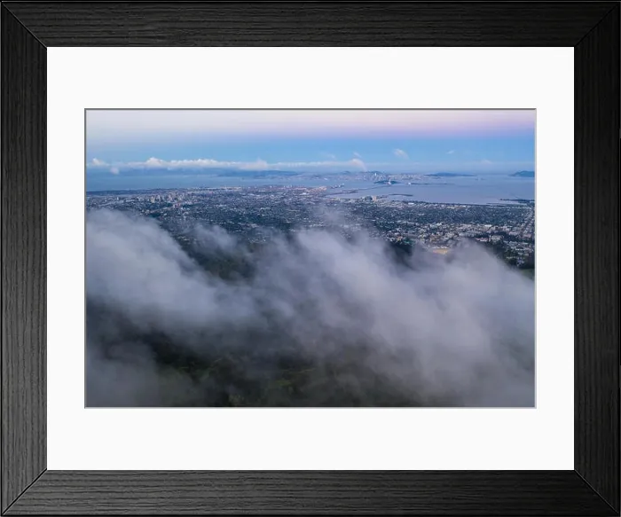 Framed Print : A beautiful sunrise illuminates the hills surrounding San Francisco Bay in Northern California. This area is often covered by a thick marine layer Framed Print : A beautiful sunrise illuminates the hills surrounding San Francisco Bay in Northern California. This area is often covered by a thick marine layer