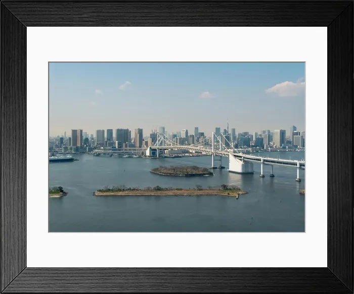 Framed Print : Tokyo Bay with a view of the Tokyo skyline and Rainbow Bridge in tokyo, Japan Framed Print : Tokyo Bay with a view of the Tokyo skyline and Rainbow Bridge in tokyo, Japan