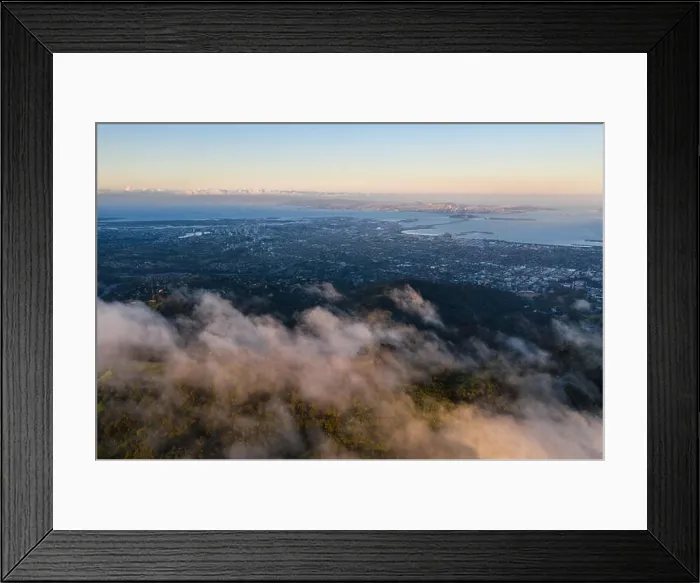 Framed Print : A beautiful sunrise illuminates the hills surrounding San Francisco Bay in Northern California. This area is often covered by a thick marine layer Framed Print : A beautiful sunrise illuminates the hills surrounding San Francisco Bay in Northern California. This area is often covered by a thick marine layer