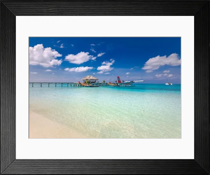 Framed Print : Long wooden jetty with seaplane and over water villa. Luxury summer travel and vacation. Idyllic beach, shore, coastline view Framed Print : Long wooden jetty with seaplane and over water villa. Luxury summer travel and vacation. Idyllic beach, shore, coastline view