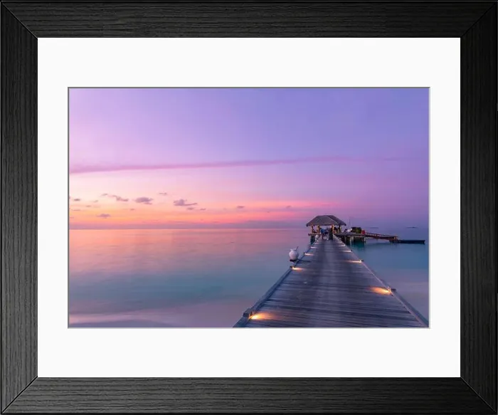 Framed Print : Amazing sunset landscape at Maldives. Luxury resort villas seascape with soft led lights under colorful sky. Tranquil luxury travel background Framed Print : Amazing sunset landscape at Maldives. Luxury resort villas seascape with soft led lights under colorful sky. Tranquil luxury travel background