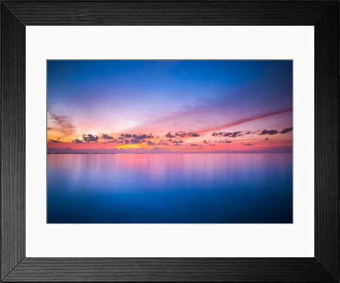 Framed Print : Calm sea with sunset sky and sun through the clouds over. Meditation ocean and sky background. Tranquil seascape. Horizon over the water Framed Print : Calm sea with sunset sky and sun through the clouds over. Meditation ocean and sky background. Tranquil seascape. Horizon over the water