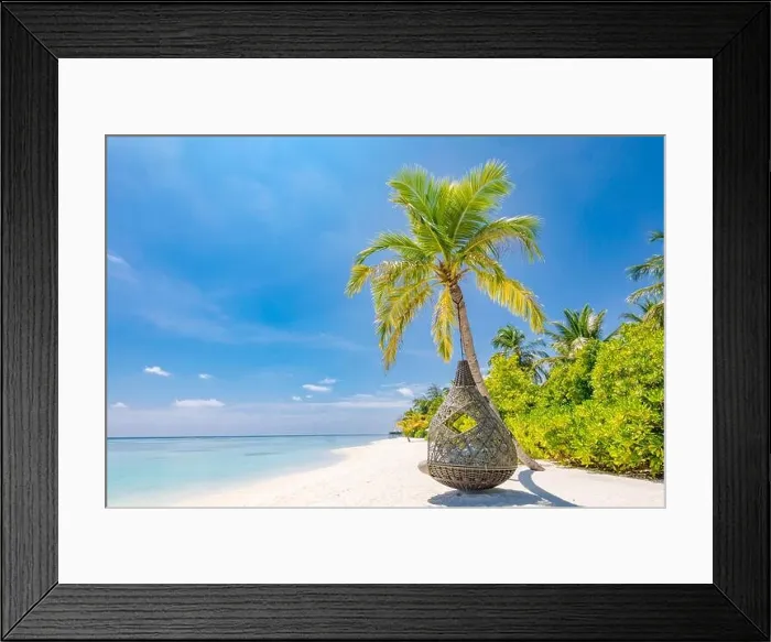Framed Print : Tropical beach background as summer landscape with beach swing or hammock and white sand and calm sea for beach banner. Perfect beach scene vacation Framed Print : Tropical beach background as summer landscape with beach swing or hammock and white sand and calm sea for beach banner. Perfect beach scene vacation