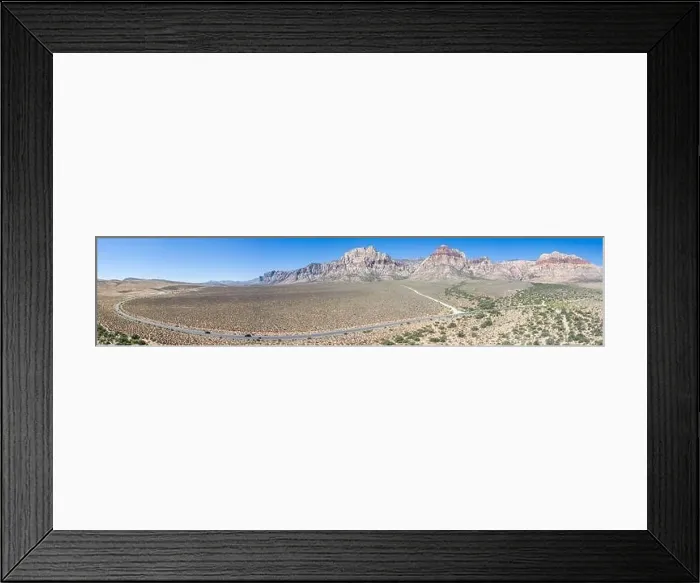 Framed Print : An aerial view shows a beautiful mountain landscape that rises from the desert surrounding Las Vegas, Nevada. This desert area is extremely warm Framed Print : An aerial view shows a beautiful mountain landscape that rises from the desert surrounding Las Vegas, Nevada. This desert area is extremely warm
