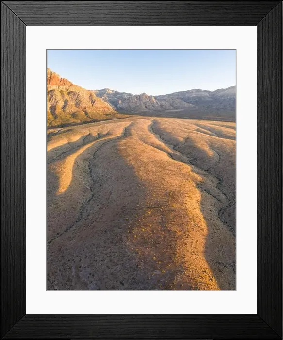 Framed Print : Early morning sunlight illuminates a beautiful mountain landscape that rises from the desert in Red Rock Canyon not far from Las Vegas, Nevada Framed Print : Early morning sunlight illuminates a beautiful mountain landscape that rises from the desert in Red Rock Canyon not far from Las Vegas, Nevada