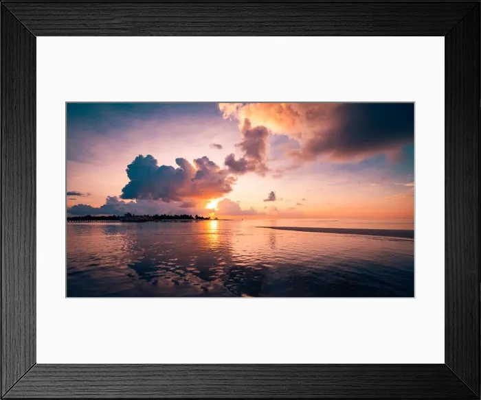 Framed Print : Amazing tropical sea and island reflection in sunset light in Maldives beach Framed Print : Amazing tropical sea and island reflection in sunset light in Maldives beach