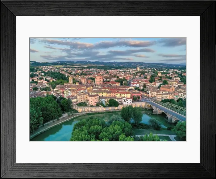 Framed Print : Old italian city Umbertide near Tevere river with cloudy sky and sunset light Framed Print : Old italian city Umbertide near Tevere river with cloudy sky and sunset light