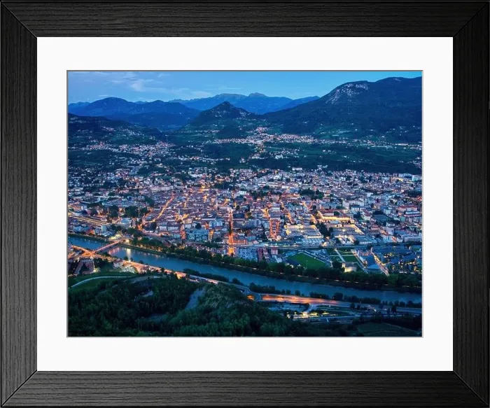 Framed Print : Trento city aerial panoramic view. Night city lights view from above in Trento city in Trentino Alto Adige in Italy Framed Print : Trento city aerial panoramic view. Night city lights view from above in Trento city in Trentino Alto Adige in Italy