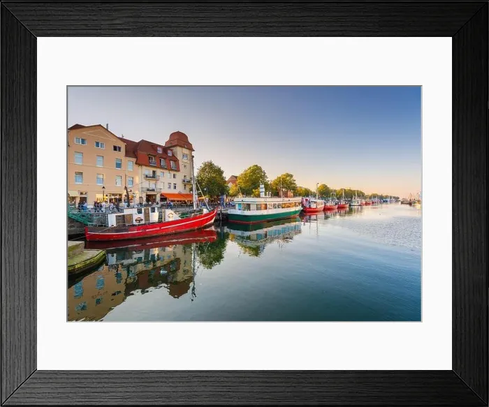 Framed Print : Warnemunde, Germany cityscape on Alte Strom old channel Framed Print : Warnemunde, Germany cityscape on Alte Strom old channel