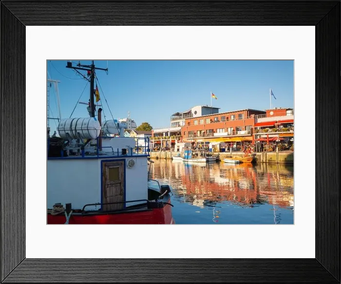 Framed Print : Warnemunde, Germany cityscape on Alte Strom old channel Framed Print : Warnemunde, Germany cityscape on Alte Strom old channel