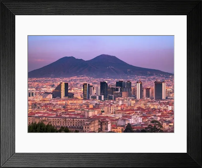 Framed Print : Naples, Italy with the financial district skyline under Mt. Vesuvius at twilight Framed Print : Naples, Italy with the financial district skyline under Mt. Vesuvius at twilight