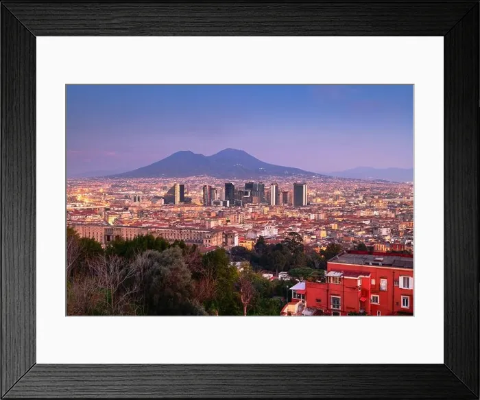 Framed Print : Naples, Italy with the financial district skyline under Mt. Vesuvius at twilight Framed Print : Naples, Italy with the financial district skyline under Mt. Vesuvius at twilight