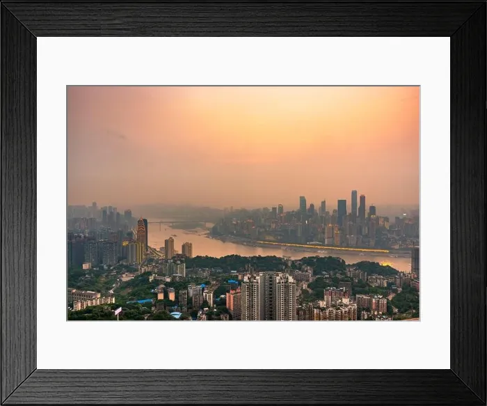 Framed Print : Chongqing, China downtown city skyline over the Yangtze River just before sunset Framed Print : Chongqing, China downtown city skyline over the Yangtze River just before sunset