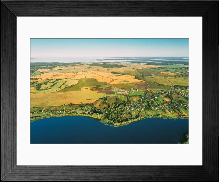 Framed Print : Lyepyel District, Vitebsk Region, Belarus. Aerial View Of Residential Area With Houses In Countryside. Morning Fog Above Lepel Lake And Town Skyline Framed Print : Lyepyel District, Vitebsk Region, Belarus. Aerial View Of Residential Area With Houses In Countryside. Morning Fog Above Lepel Lake And Town Skyline