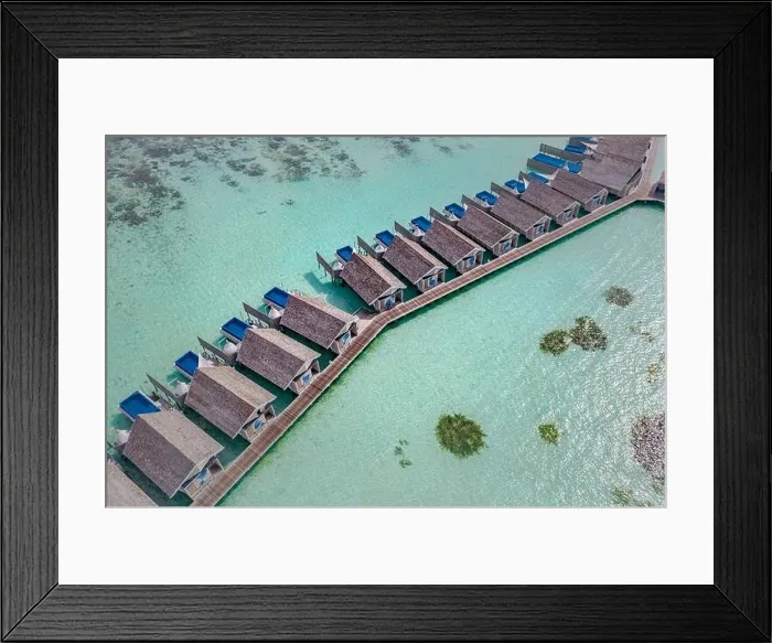 Framed Print : Perfect aerial landscape, luxury tropical resort or hotel with water villas and beautiful beach scenery. Amazing bird eyes view in Maldives, landscape Framed Print : Perfect aerial landscape, luxury tropical resort or hotel with water villas and beautiful beach scenery. Amazing bird eyes view in Maldives, landscape