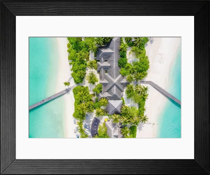 Framed Print : Perfect aerial landscape, luxury tropical resort or hotel with water villas and beautiful beach scenery. Amazing bird eyes view in Maldives, landscape Framed Print : Perfect aerial landscape, luxury tropical resort or hotel with water villas and beautiful beach scenery. Amazing bird eyes view in Maldives, landscape