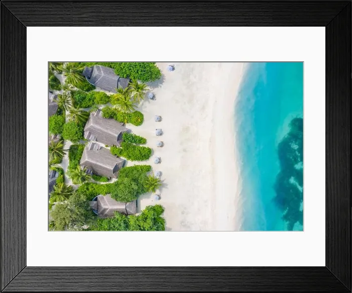 Framed Print : Perfect aerial landscape, luxury tropical resort or hotel with water villas and beautiful beach scenery. Amazing bird eyes view in Maldives, landscape