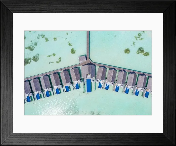 Framed Print : Perfect aerial landscape, luxury tropical resort or hotel with water villas and beautiful beach scenery. Amazing bird eyes view in Maldives, landscape Framed Print : Perfect aerial landscape, luxury tropical resort or hotel with water villas and beautiful beach scenery. Amazing bird eyes view in Maldives, landscape