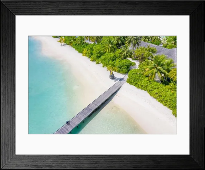 Framed Print : Perfect aerial landscape, luxury tropical resort or hotel with water villas and beautiful beach scenery. Amazing bird eyes view in Maldives, landscape Framed Print : Perfect aerial landscape, luxury tropical resort or hotel with water villas and beautiful beach scenery. Amazing bird eyes view in Maldives, landscape