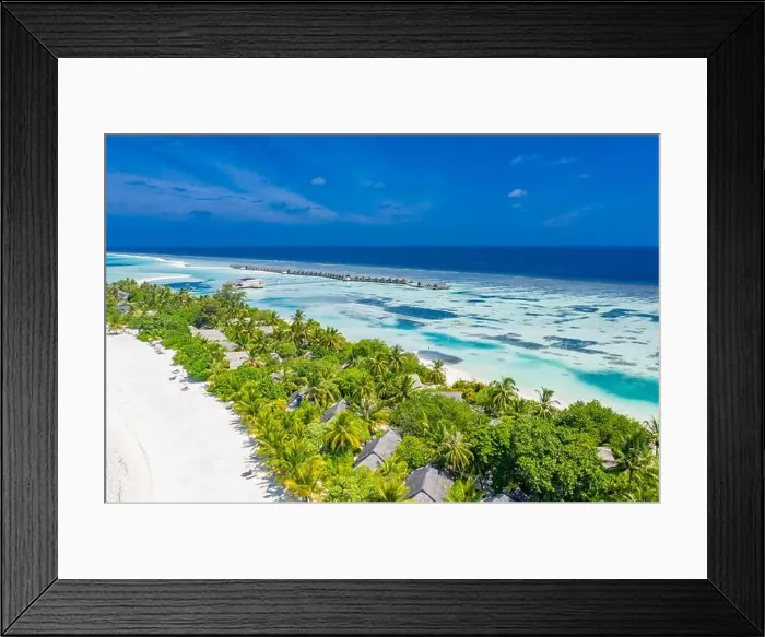 Framed Print : Perfect aerial landscape, luxury tropical resort or hotel with water villas and beautiful beach scenery. Amazing bird eyes view in Maldives, landscape Framed Print : Perfect aerial landscape, luxury tropical resort or hotel with water villas and beautiful beach scenery. Amazing bird eyes view in Maldives, landscape