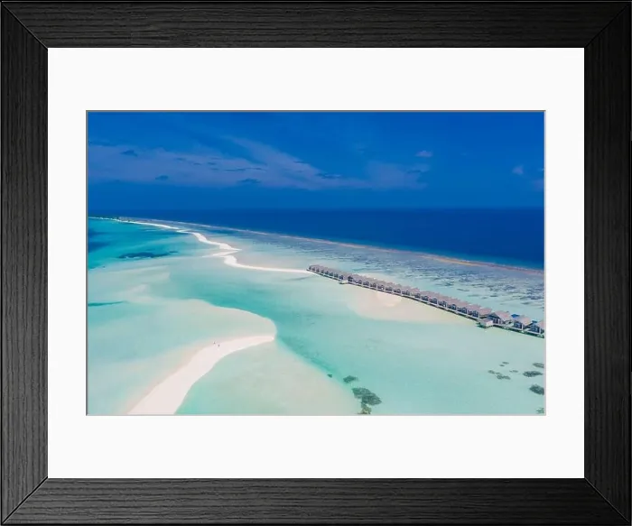 Framed Print : Perfect aerial landscape, luxury tropical resort or hotel with water villas and beautiful beach scenery. Amazing bird eyes view in Maldives, landscape