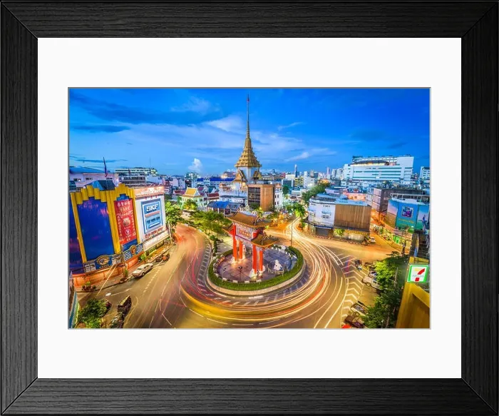 Framed Print : BANGKOK, THAILAND - SEPTEMBER 23, 2015: Traffic passes through Chinatown at Odeon Roundabout. The roundabout marks one end of Chinatown Framed Print : BANGKOK, THAILAND - SEPTEMBER 23, 2015: Traffic passes through Chinatown at Odeon Roundabout. The roundabout marks one end of Chinatown