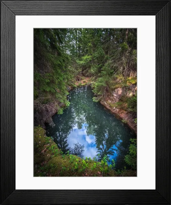 Framed Print : Old and historical mine full with greenish jade color water in middle of forest. This mine is over 500 hundred years old
