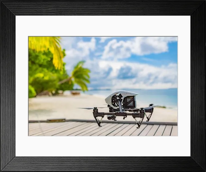 Framed Print : Drone flying over sea coast and palm trees. Tropical footage or photo creating. UAV professional drone in exotic island view Framed Print : Drone flying over sea coast and palm trees. Tropical footage or photo creating. UAV professional drone in exotic island view