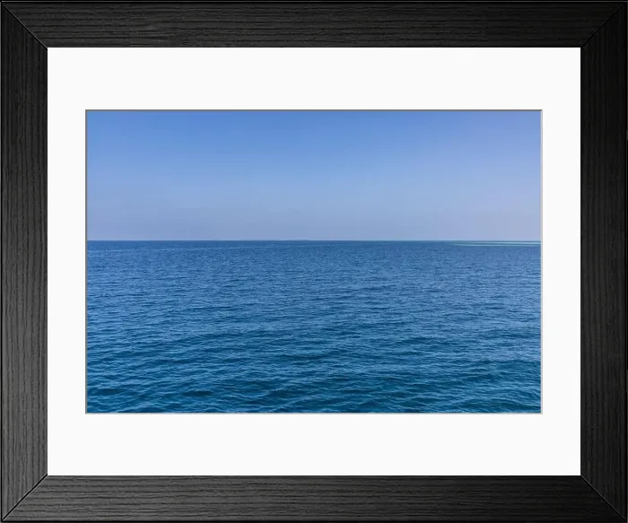 Framed Print : Seascape with sea horizon and almost clear deep blue sky background Framed Print : Seascape with sea horizon and almost clear deep blue sky background