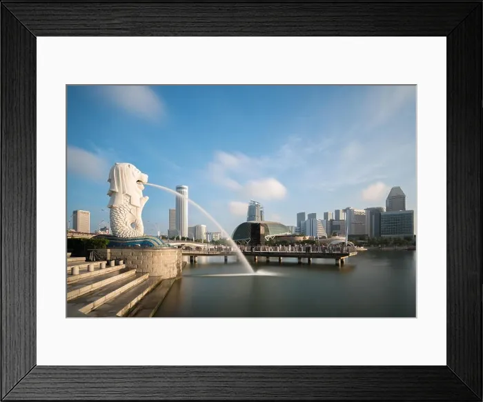 Framed Print : SINGAPORE - FEBRUARY 27, 2017 : Merlion statue fountain with Singapore business district skyline with sunrise in morning at Marina Bay, Singapore Framed Print : SINGAPORE - FEBRUARY 27, 2017 : Merlion statue fountain with Singapore business district skyline with sunrise in morning at Marina Bay, Singapore